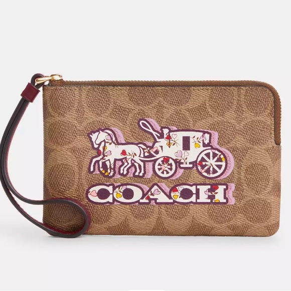 Coach CORNER ZIP WRISTLET IN SIGNATURE CANVAS WITH HORSE AND CARRIAGE PRINT - Picture 2 of 3